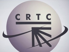 A CRTC logo is shown in Montreal, Monday, September 10, 2012, on the opening day of the CRTC hearings into the proposed acquisition of Astral Media Inc., by BCE/Bell Canada. THE CANADIAN PRESS/Graham Hughes