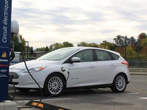 The Ford Focus Electric plugged in to the Electric Circuit at the Pierrefonds-Roxboro AMT train station. Photo by Kevin Mio/The Gazette