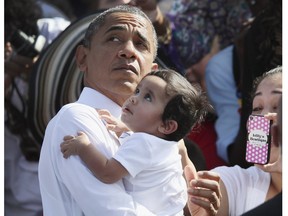 Media attention focused on the last three U.S. presidential debates has benefited both U.S. President Barack Obama and Republican challenger Mitt Romney. But in the end, is winning the most powerful job on earth a matter of kissing babies and shaking hands?(Photo by Joe Raedle/Getty Images)