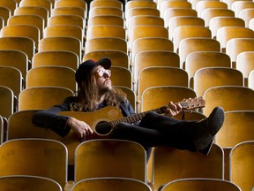 King Tuff, aka Kyle Thomas, poses for portraits at Malcolm X Academy, an abandoned school that was purchased by a real estate developer and rented out as, among other things, a recording studio, in Detroit, MI, while recording with Robert Harlow, of The Go and Conspiracy of Owls, Thursday, July 7, 2011. (Photo By Jeffrey Sauger; courtesy of Sub Pop Records)