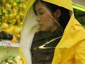 In this scene from Sion Sono's film Land of Hope, Megumi Kagurazaka plays a pregnant woman who wonders if this produce is as safe as the shop owners claim that it is. She fears that it is contaminated with radiation.