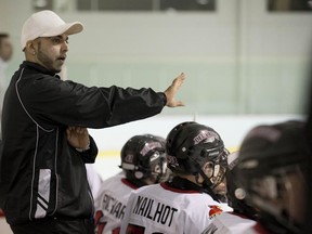 MONTREAL, QUE:  October,  7, 2012 - Head coach Ammar Naekthe of the Deux Rives bantam BB directs his players during play against the West Island Royals in Pierrefonds Sunday, October 7, 2012,  (Peter McCabe / THE GAZETTE)