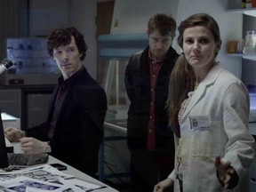 Benedict Cumberbatch, left, Martin Freeman, and Louise Brealey in a DVD screen grab from Season One of the BBC'sSherlock Holmes.