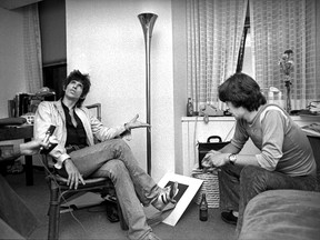 Juan Rodriguez (off camera) interviews Keith Richards and Mick Jagger in New York City at Rolling Stones Records Inc. in 1977. PHOTO BY MICHAEL DUGAS (The Gazette)