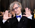 Filmmaker Wim Wenders at the 84th Annual Academy Awards on Feb. 26, 2012 in Hollywood, California.  Look, his bowtie matches his colourful glasses. How cool is that? I've got more rings than he does, though. (Ethan Miller/Getty Images)