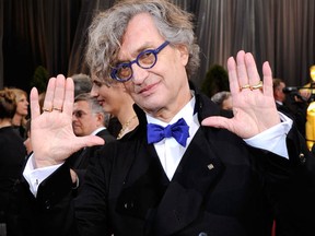 Filmmaker Wim Wenders at the 84th Annual Academy Awards on Feb. 26, 2012 in Hollywood, California.  Look, his bowtie matches his colourful glasses. How cool is that? I've got more rings than he does, though. (Ethan Miller/Getty Images)