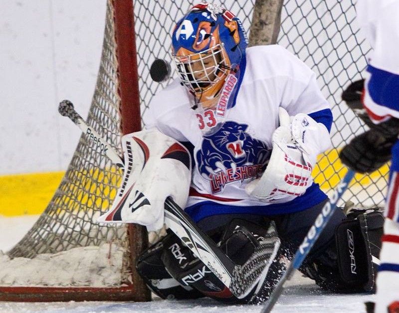 Atom CC hockey action: Lakeshore Tigers vs. Lakeshore Panthers ...