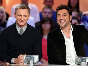 British actor Daniel Craig (L) and Spanish actor Javier Bardem, starring in the new James Bond film Skyfall, take part in the TV show Le grand journal on French TV Canal+, on October 25, 2012 in Paris. (THOMAS SAMSON/AFP/Getty Images)