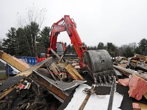 Dean Trineer of Tri-Tools Rentals volunteered his time and machinery to demolish and clear away the home.