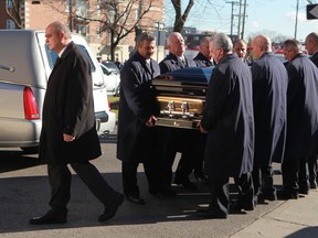 The coffin  of Joseph Di Maulo is taken from hearse towards the church Notre Dame du Mont Carmel on Wednesday November 14, 2012. (Pierre Obendrauf / THE GAZETTE)