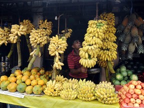 A Sri Lankan vendor sells bananas at a market in Colombo on September 17, 2012.  (LAKRUWAN WANNIARACHCHI/AFP/GettyImages)