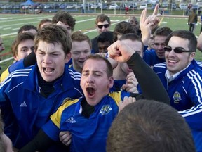 John Abbott Islanders' player celebrate their 19-0 win over Dawson College Blues on Sunday Nov. 11.