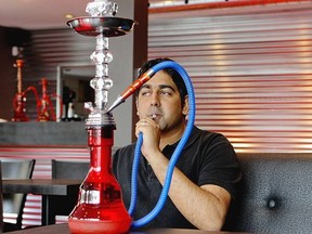 Arif Ismael of Le Café Barcode says he offers 30 flavours of fruit-based molasses to be smoked using a water pipe.