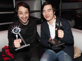 L-R) Filmmakers Mila Aung-Thwin and Yung Chang with their Cinema Eye Honors for the film Up The Yangtze, on March 29, 2009 in New York City.  (Astrid Stawiarz/Getty Images)