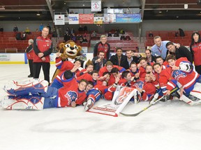 Lakeshore peewees celebrate after winning St. Jérôme tourney.