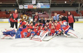 Lakeshore peewees celebrate after winning St. Jérôme tourney.