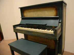 The piano used as the prop for the key flashback scene between Humphrey Bogart and Ingrid Bergman in Casablanca is on display during an auction sale at Sotheby's in New York, December 14, 2012. (EMMANUEL DUNAND/AFP/Getty Images)