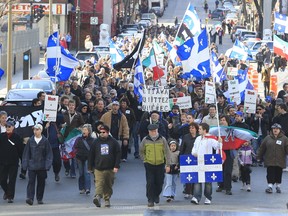 Pro-Bill 101 protestors chanting "Montreal Francaise," march along St Laurent Boulevard in Chinatown, Montreal, Sunday April 11, 2010.  The nationalist . (THE GAZETTE/Phil Carpenter)