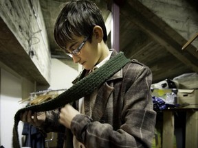 Joe Stones, of Kirkland, plays Tiny Tim in A Christmas Carol at the Rialto Theatre.