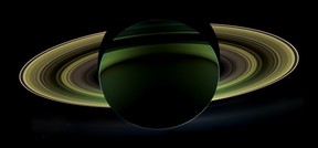 In this image provided by NASA Tuesday Dec. 18, 2012 NASA's Cassini spacecraft has delivered a glorious view of Saturn, taken while the spacecraft was in Saturn's shadow. The cameras were turned toward Saturn and the sun so that the planet and rings are backlit. In addition to the visual splendor, this special, very-high-phase viewing geometry lets scientists study ring and atmosphere phenomena not easily seen at a lower phase. (AP Photo/NASA)