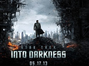 The figure on the Star Trek Into Darkness poster is very reminiscent of Sherlock Holmes, with his billowing coat. Presumably, he is the villain played by Benedict Cumberbatch. The poster is from the website http://www.startrekmovie.com/