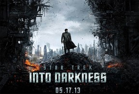 The figure on the Star Trek Into Darkness poster is very reminiscent of Sherlock Holmes, with his billowing coat. Presumably, he is the villain played by Benedict Cumberbatch. The poster is from the website http://www.startrekmovie.com/