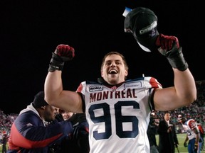 Als' defensive-tackle J.P. Bekasiak celebrates Grey Cup victory.
Don Healy/Canwest News