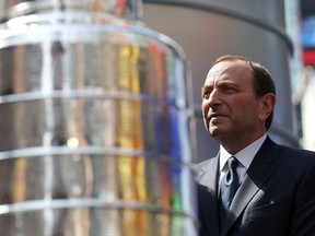 NHL commissioner Gary Bettman alongside the Stanley Cup. After spending 113 days as the most reviled man in hockey, Bettman can take some solace in the fact that fans will now go back to hating the ref. (Photo by Justin Sullivan/Getty Images)