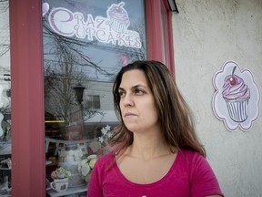 Tanya Bouzaglo has been told by l'Office québécois de la langue française to change the English sign on her storefront window in Pointe-Claire.
