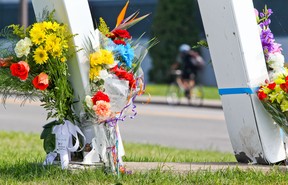Flowers in honour of STM bus driver Sylvain Ferland were left at the site of a fatal collision last August between the bus he was driving and a car at the corner of 55th ave. and Lindsay St. in Dorval, west of Montreal. In addition to the bus driver, a passenger in the car also died in the accident. Charges have been filed against the driver of the car that struck the bus.          (John Mahoney/THE GAZETTE)