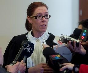 Crown prosecutor Marie-Claude Bourassa speaks to reporters following the court appearance of a 12-year-old boy charged in the shooting death of his 16-year-old brother  on the evening of Monday January 21. (Pierre Obendrauf / THE GAZETTE)