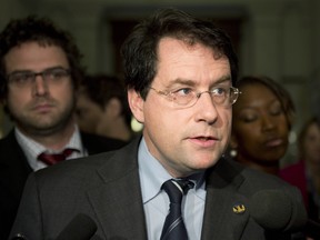 Quebec Democratic Institutions Minister Bernard Drainville is mulling possible legislation that would make an MNA who switches parties in the middle of their term obliged to run in  - and pay for - a byelection in their riding. THE CANADIAN PRESS/Jacques Boissinot