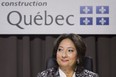 Justice France Charbonneau smiles as she sits on the opening day of a Quebec inquiry looking into allegations of corruption in the province's construction industry in Montreal. The inquiry resumed today after an extended holiday break. THE CANADIAN PRESS/Graham Hughes