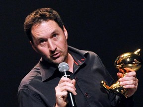 Canadian cartoonist Guy Delisle, winner of the best album with "Chroniques de Jerusalem"  speaks during the 39th edition of Angouleme world comic strip festival, on January 29, 2012 in Angouleme, France.  His book Pyongyang will be made into a feature film. (PIERRE ANDRIEU/AFP/Getty Images)
