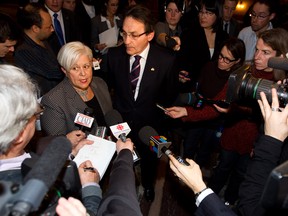 Happier days: Vision Montreal leader Louise Harel and Projet Montreal leader Richard Bergeron meet the press before a city council meeting in February of 2011. Since then, both parties have spent almost as much time sniping at each other as the administration, and the battling will likely worsen as Montreal enters an election year. (Dario Ayala/THE GAZETTE)