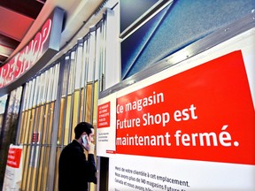 MONTREAL, QUEBEC; JANUARY 31, 2013 -- A man enters the closed Future Shop store at the Pepsi Forum in Montreal Thursday, January 31, 2013.    (John Mahoney/THE GAZETTE)