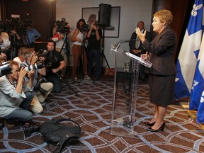 Pauline Marois holds her first press conference  following her election victory in the Quebec provincial election on Sept. 5. The rules governing press conferences here are, to say the least, a tad more relaxed than those imposed by the Harper government.                      (John Mahoney/THE GAZETTE)