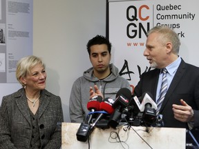 Pitching woo, one anglo at a time. Jean-Francois Lisee, minister responsible for Montreal and the English language, right with hip-hop artist David Hodges and Quebec Community Groups Network director general Sylvia Martin-Desforges at press conference at QCGN offices in Montreal promoting Hodges song Notre Home which aims to build bridges between English and French-speaking Quebecers.     (John Mahoney/THE GAZETTE)