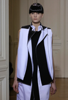 A black and white layered ensemble from Rad Hourani, above, shown in Paris at the Centre Culturel Canadien as part of haute couture fashion week. Below, white layered top. PHOTOS THOMAS PADILLA, THE GAZETTE