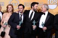 Actress Kerry Bishe, left, actor Rory Cochrane, actor-director Ben Affleck and actor Victor Garber, winners of Outstanding Performance by a Cast in a Motion Picture for Argo, make a diagonal pose in the press room at the 19th Annual Screen Actors Guild Awards on January 27, 2013 in Los Angeles, California.  (Frazer Harrison/Getty Images)