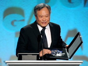 Director Ang Lee accepts the Feature Film Nomination Plaque for Life of Pi during the Directors Guild Of America Awards on February 2, 2013 in Los Angeles, California.  On February 5, 2013, Ang Lee resceived another honour, a Visionary Award from the Visual Effects Society. (Kevin Winter/Getty Images)