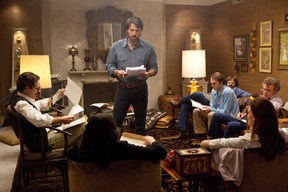 This film image released by Warner Bros. Pictures shows Ben Affleck as Tony Mendez, center, in "Argo," a rescue thriller about the 1979 Iranian hostage crisis. At the moment, "Argo" is the favourite in Loto-Quebec's betting pool for the Feb. 24 Oscars. Quebecers are now able to bet on their picks for the Oscar Awards. (AP Photo/Warner Bros., Claire Folger)