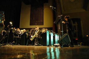 Adam O'Callaghan (standing) leads the musicians of Montreal's Ballroom Blitz Big Band.