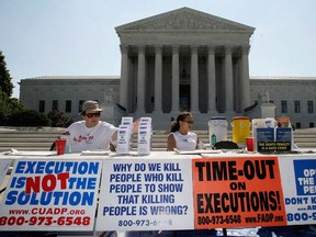 WASHINGTON - JULY 01:  Activists participate during a vigil against the death penalty in front of the U.S. Supreme Court July 1, 2008 in Washington, DC. (Alex Wong/Getty Images)