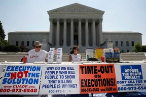 WASHINGTON - JULY 01:  Activists participate during a vigil against the death penalty in front of the U.S. Supreme Court July 1, 2008 in Washington, DC. (Alex Wong/Getty Images)