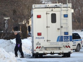 The scene the next day outside the house in Dorval where the shooting took place.