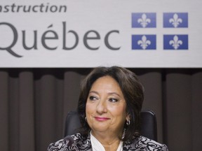 Justice France Charbonneau smiles as she sits on the opening day of a Quebec inquiry looking into allegations of corruption in the province's construction industry last May. After a somewhat wobbly start after the probe resumed last month, the inquiry has found its stride, dealing with its first "hostile" witness this week. THE CANADIAN PRESS/Graham Hughes