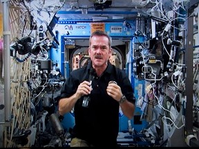 There was a surreal moment in outer space this morning, as the man who played Captain James T. Kirk chatted with real-life astronaut Chris Hadfield (pictured above) aboard the International Space Station. William Shatner, the Canadian-born actor of "Star Trek" fame, spoke for a few minutes with Hadfield, who is currently on a five-month space voyage.THE CANADIAN PRESS/Paul Chiasson