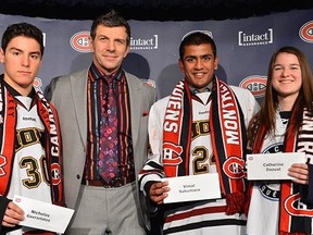 Nicholas Gavrielatos, pictured left, with Montreal Canadiens general manager Marc Bergevin, Vimal Sukumaran and Catherine Daoust.