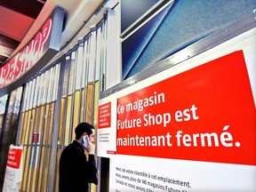 A man enters the closed Future Shop store at the Pepsi Forum in Montreal Thursday. (John Mahoney/THE GAZETTE)